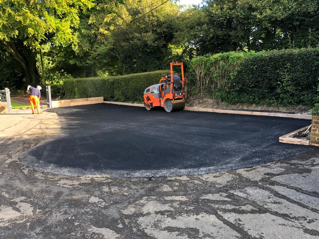 This is a photo of a bitumen driveway which is in the process of being installed by Little River Road Tech
